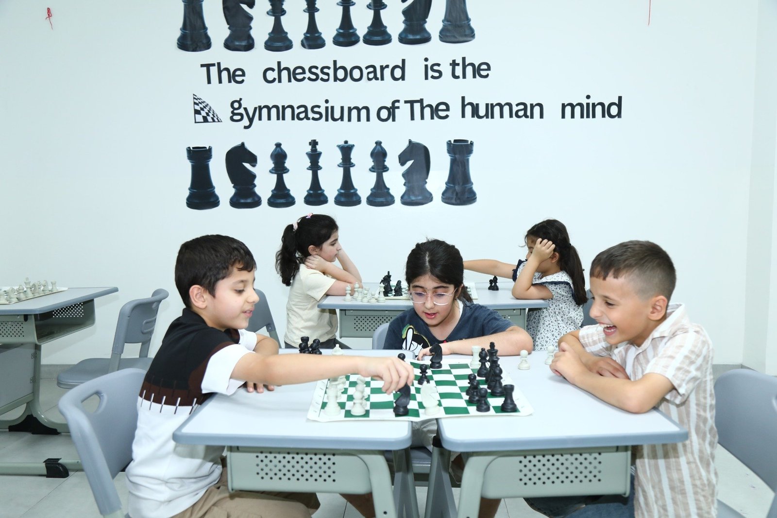WIN students playing chess